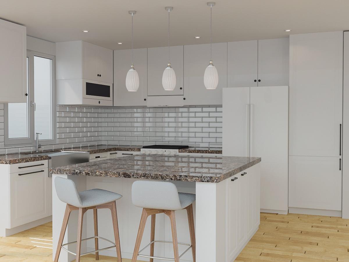 Bright and modern newly remodeled kitchen with marble countertops and stainless steel appliances.